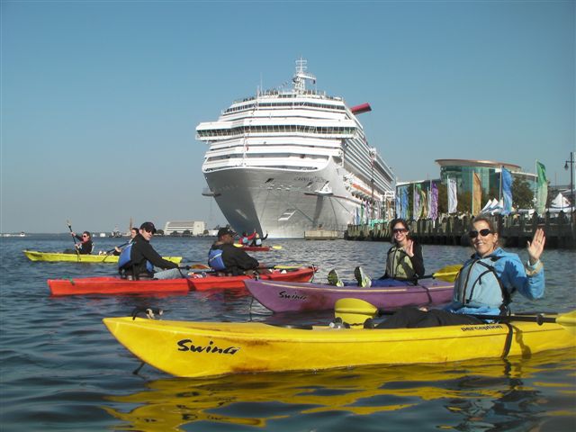  For a more active experience on the water, take a kayak tour with Kayak Nature Tours. Take your pick among various tours through surrounding waterways. One of the most popular summer tours is the Dolphin Tour, with a choice of launching from two locations. Our group took a short tour around the Elizabeth River Harbor where we paddled around a cruise ship and the Battleship Wisconsin, another popular tourist attraction that is one of the largest and last battleships built by the U.S. Navy.