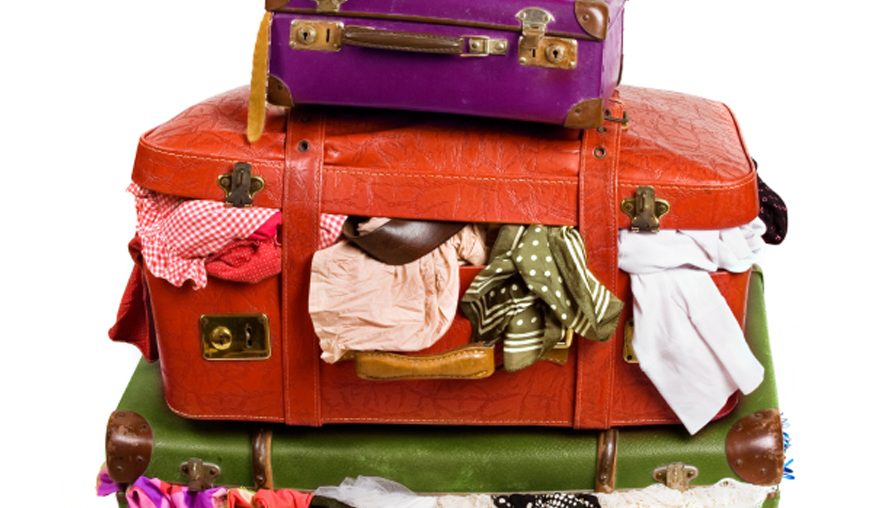 packing tips, suitcase stuffed with clothes
