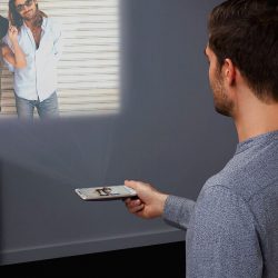 The Insta-Share Projector lets you project movies right on the wall. Or the ceiling